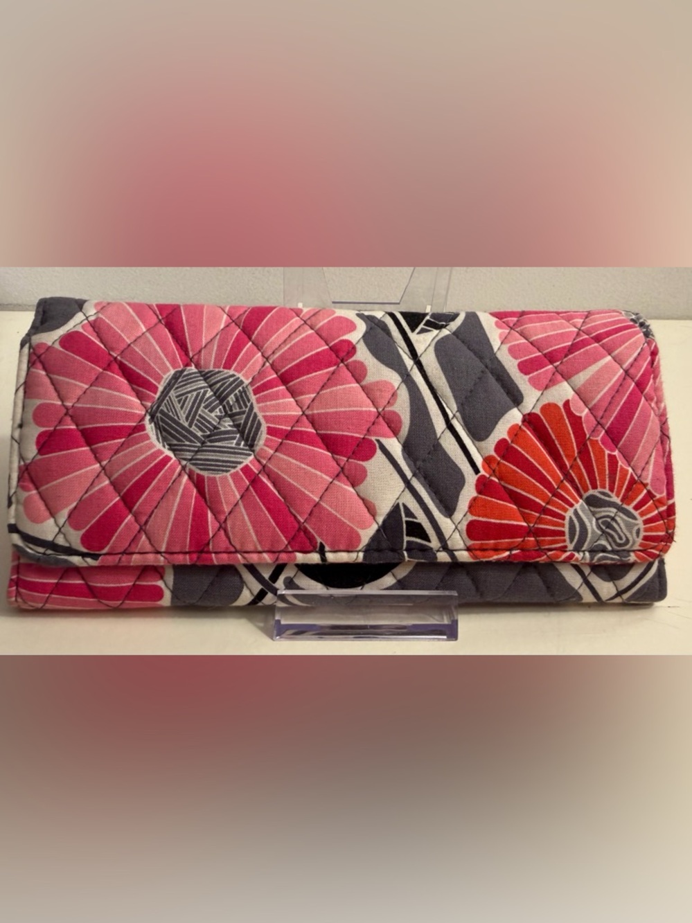 Vera Bradley trifold wallet in the “Cheery Blossoms” pattern.